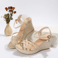 Women's simple wedge sandals with cloth upper and fish mouth toe in beige, black, and white.