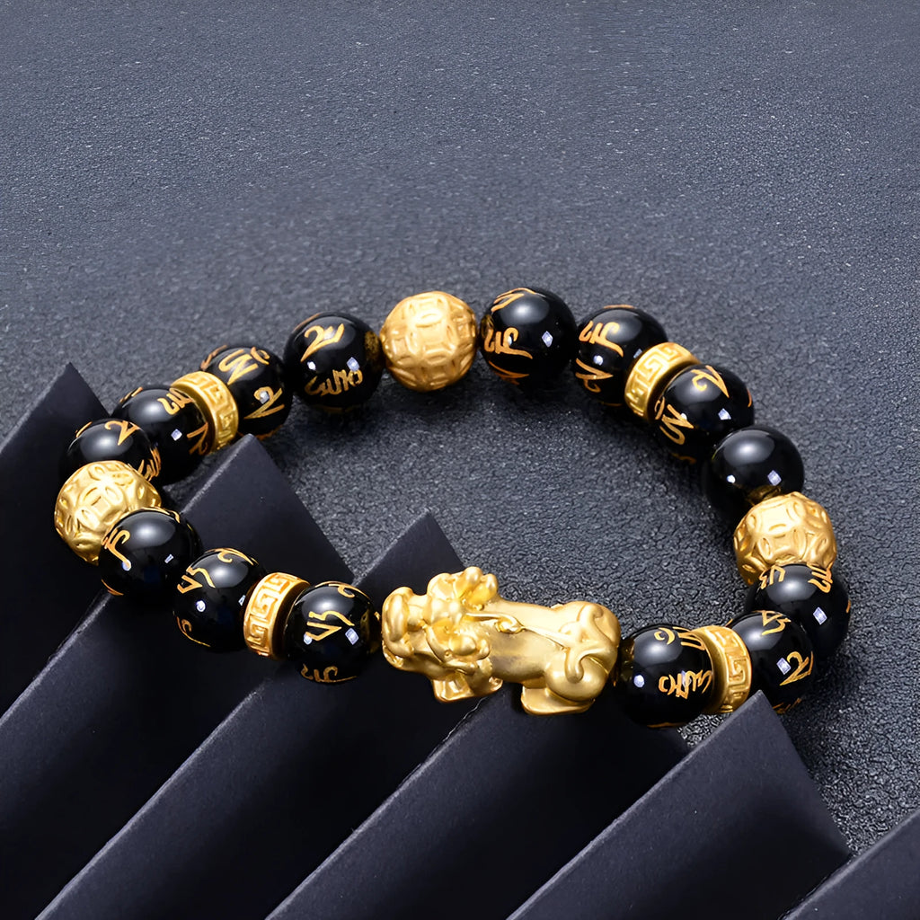 Unisex natural black agate stone bracelet with imitation gold accent, round bead design