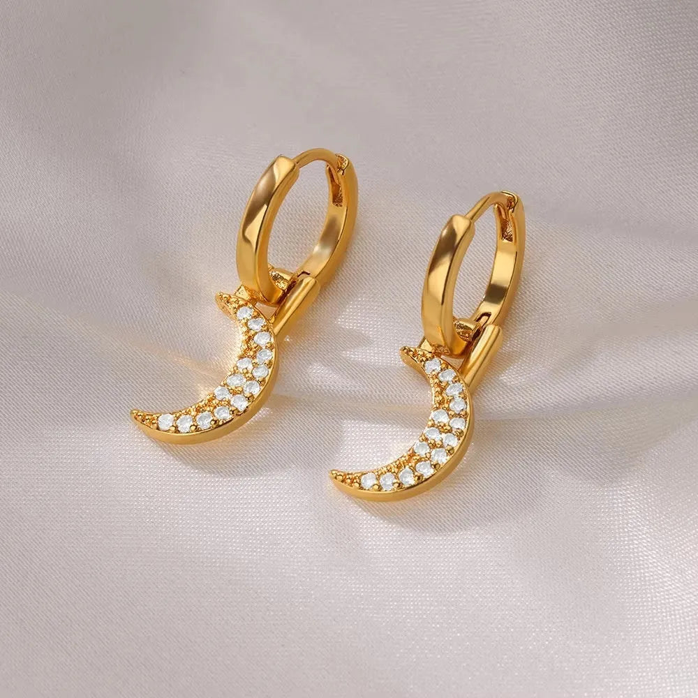 Women's irregular geometric butterfly earrings in copper with heart, bow and star motifs