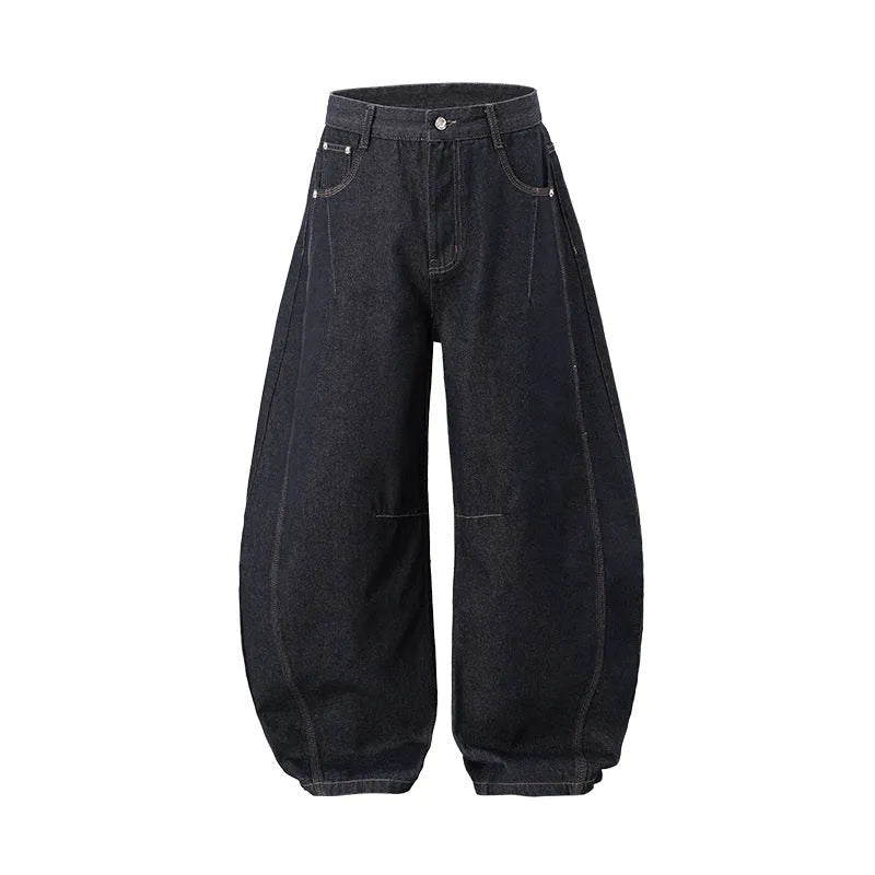 Men's wide leg denim trousers in original cow colour on a mid-waist model