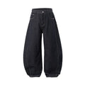 Men's wide leg denim trousers in original cow colour on a mid-waist model