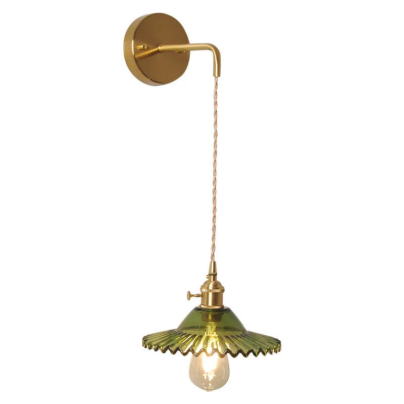 Retro brass bedside lotus wall lamp with glass shade in transparent finish, copper body, 22cm diameter