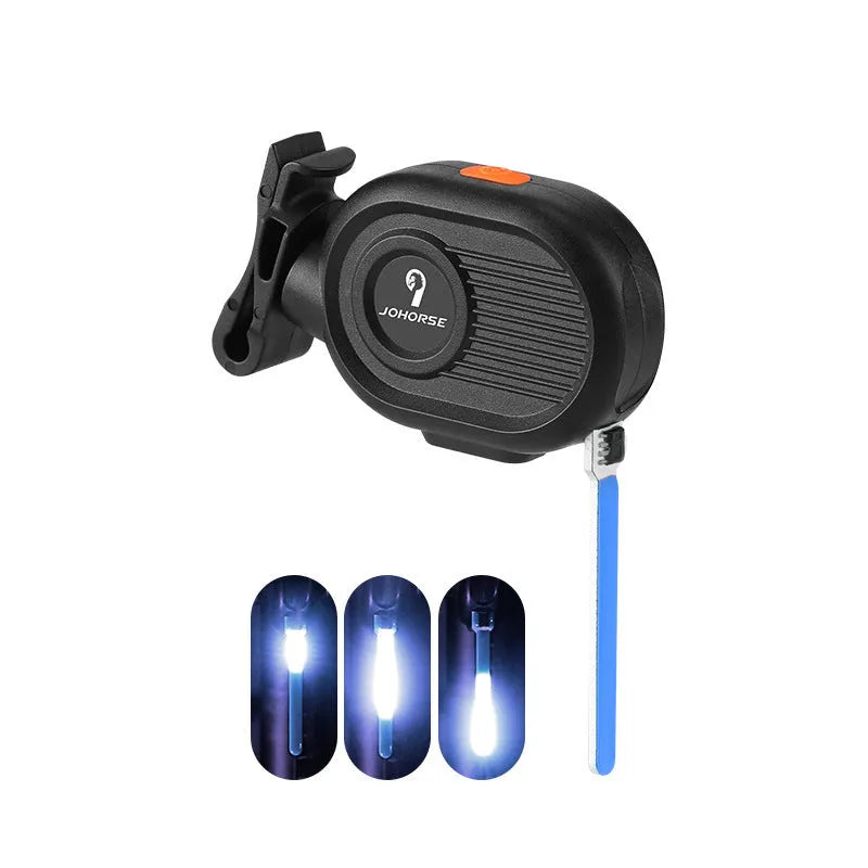 Bicycle tail light showing blue running waterfall light effect on a black background