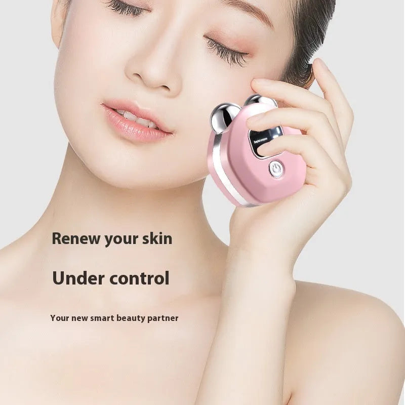 Portable double-roller facial massage instrument in light blue with micro current and hot compress functions