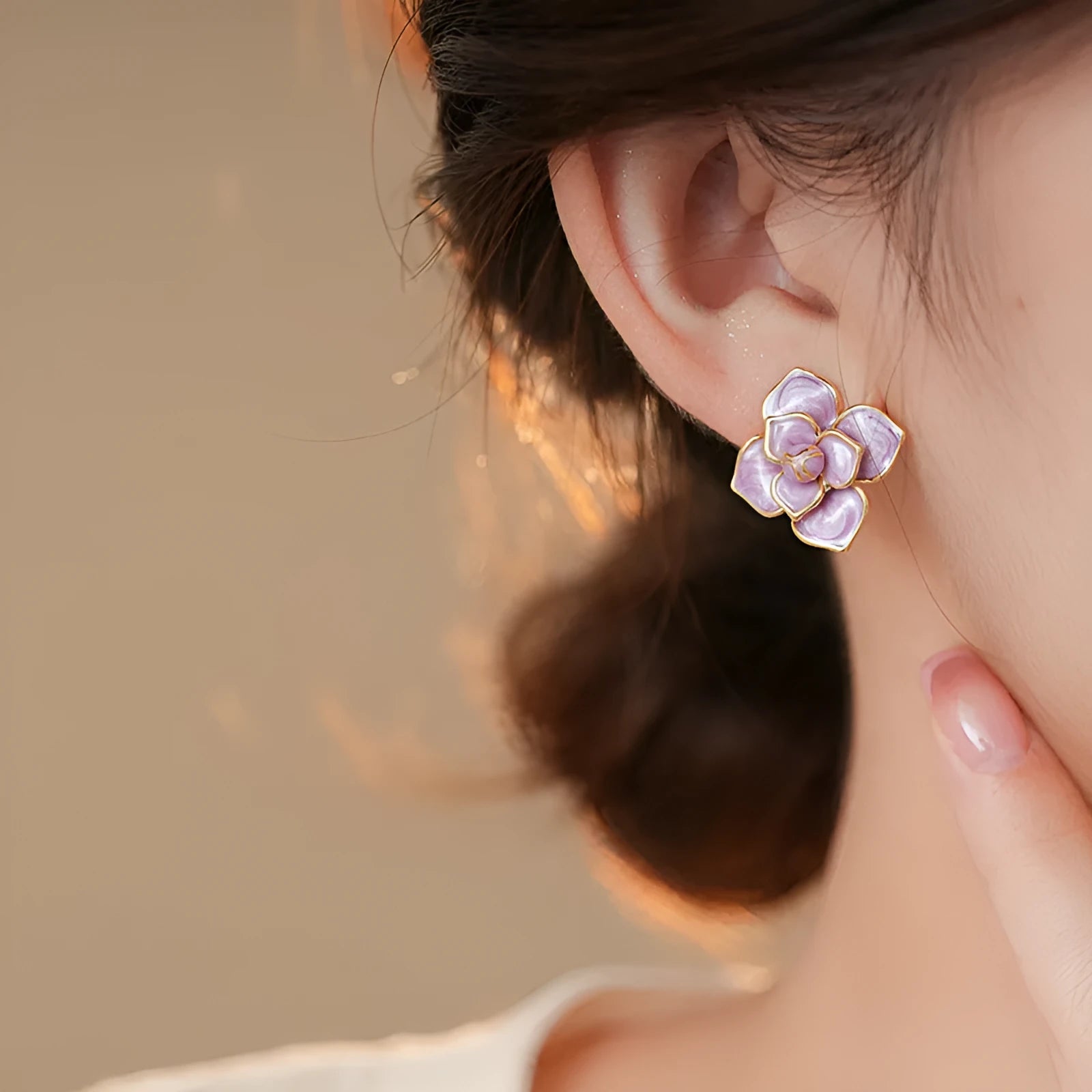 Gold plated copper flower stud earrings with oil-spot glaze in golden-purple colour