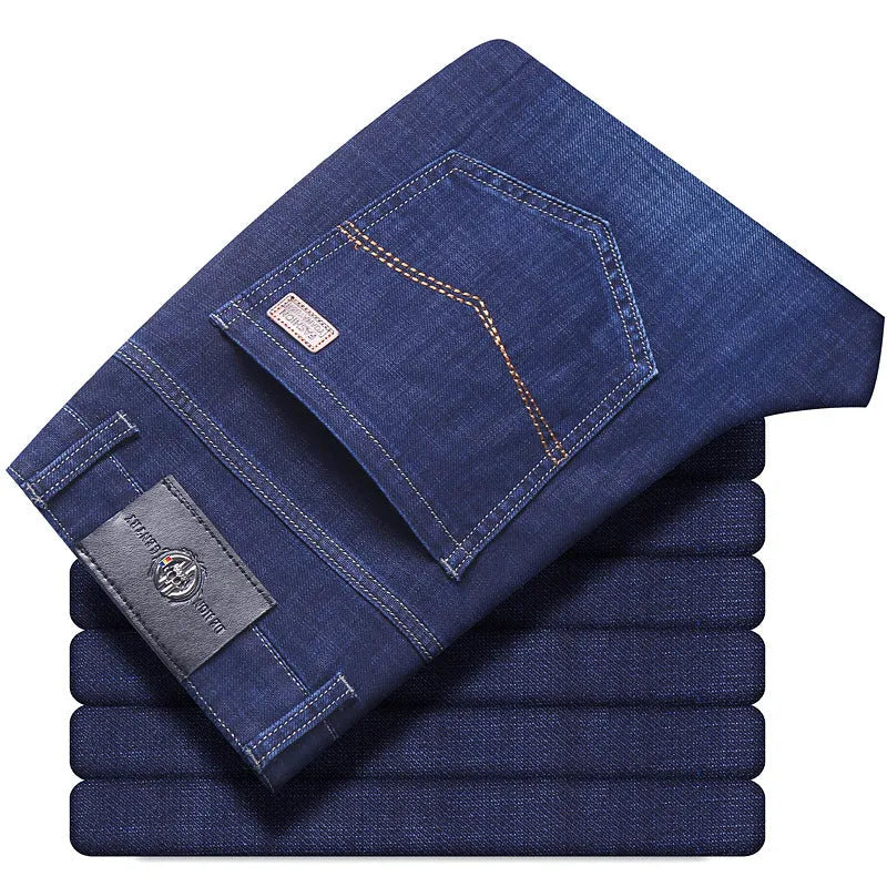 Men's black and blue stretch denim jeans showing straight-leg business casual style with mid waist and zip fly