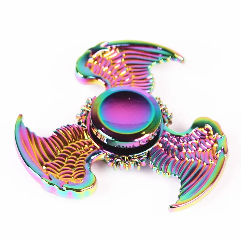 Colourful alloy fidget spinner with six axis design and electroplated finish on a light background
