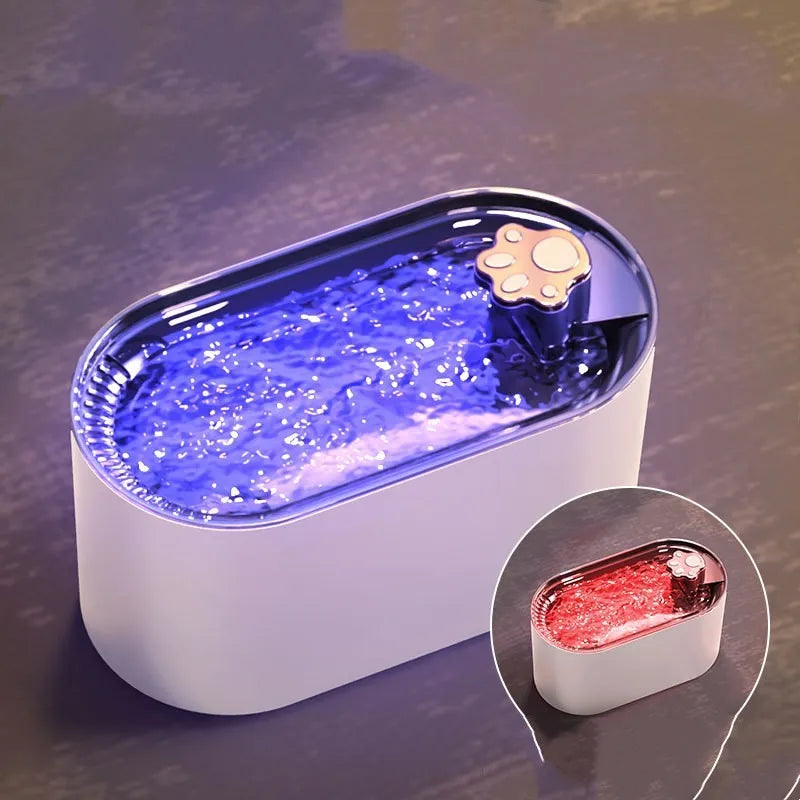 Berlin blue automatic pet water fountain with filter on a kitchen floor.