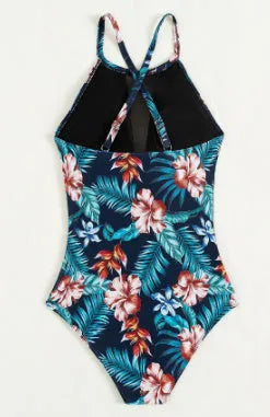 Women's deep V neck one-piece swimsuit in a printed pattern with polyester lining.