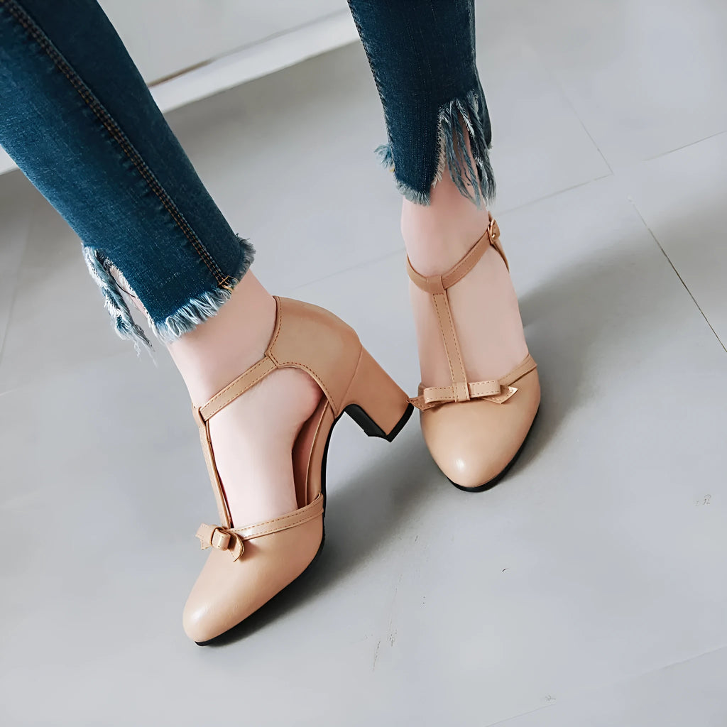 Women's apricot chunky heel sandals with hollow-out design, bow tie, and buckle strap on a 6.5cm rubber sole.