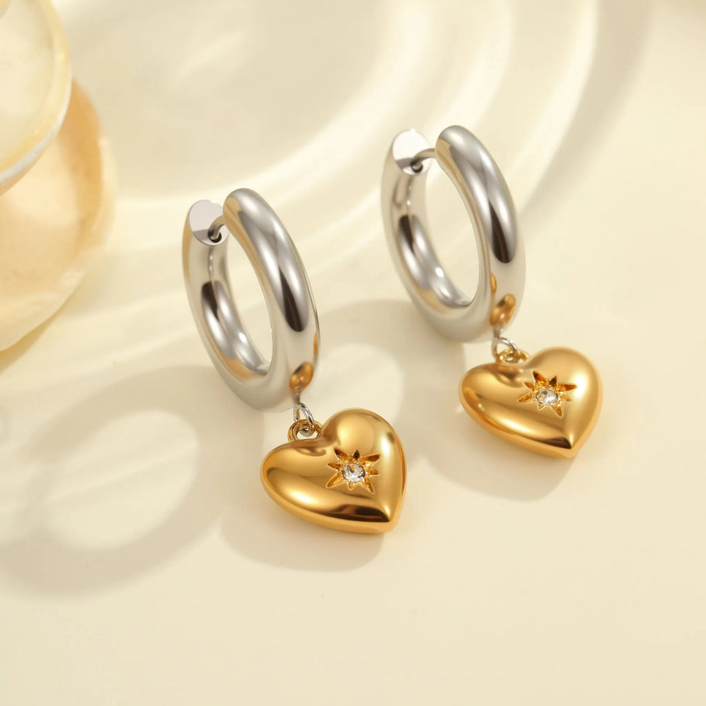 Christmas tree heart earrings in stainless steel with 18K gold plating showing star and geometric shapes