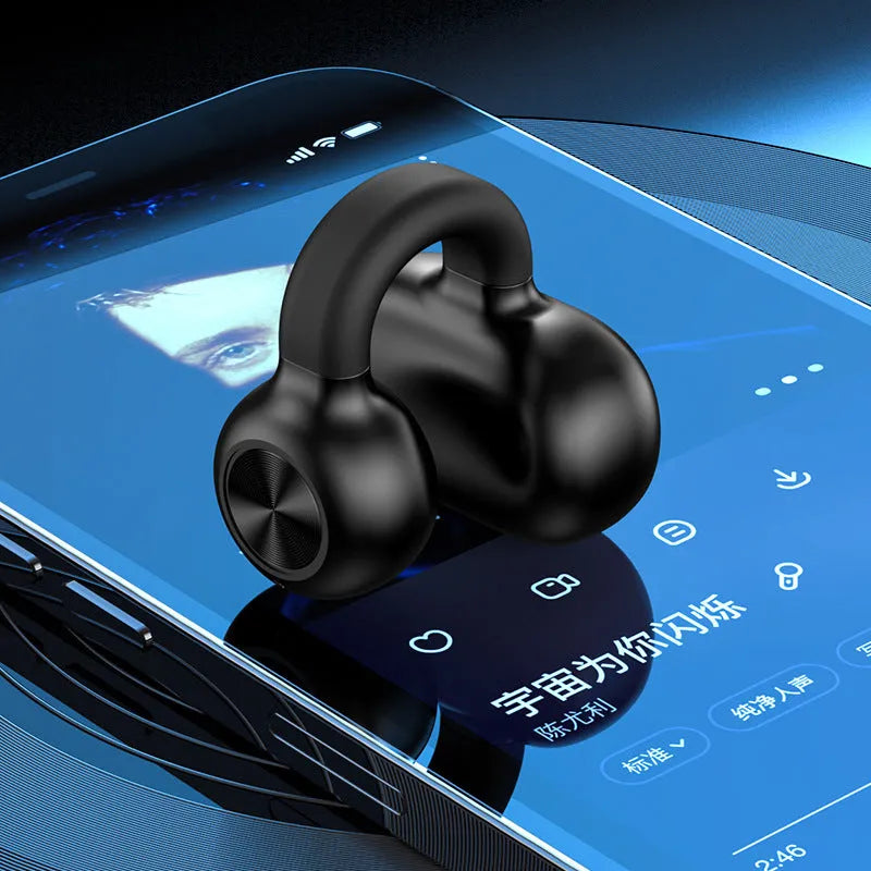 Black wireless clip-on bone conduction Bluetooth earphones shown with charging cable.