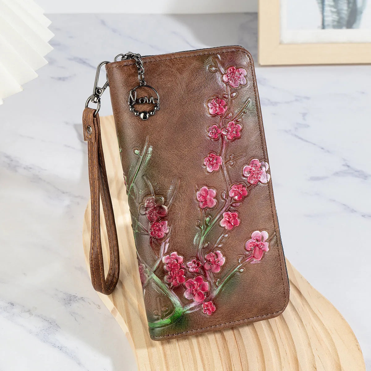 Embossed hand-painted Chinese style floral pattern zipper handbag in black, brown, or coffee.