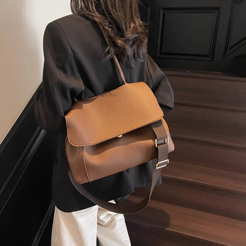 Vintage casual PU tote bag in horizontal square shape with double straps and sewn thread detailing.