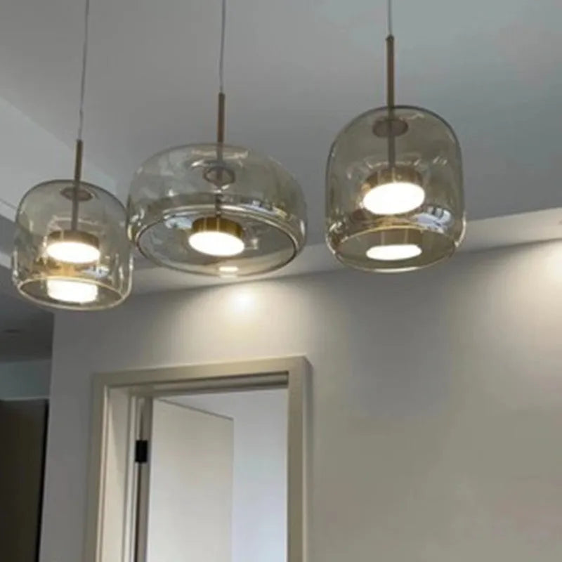 Single-head hanging glass pendant lamp with iron body, adjustable height 1.5m, clear shade, simple modern style