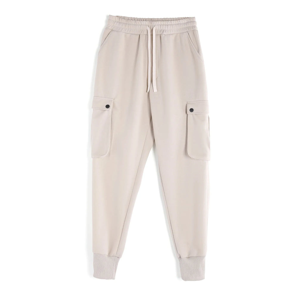 Men's loose-fit ankle-tied cotton sports trousers in solid colour with multi-pocket design