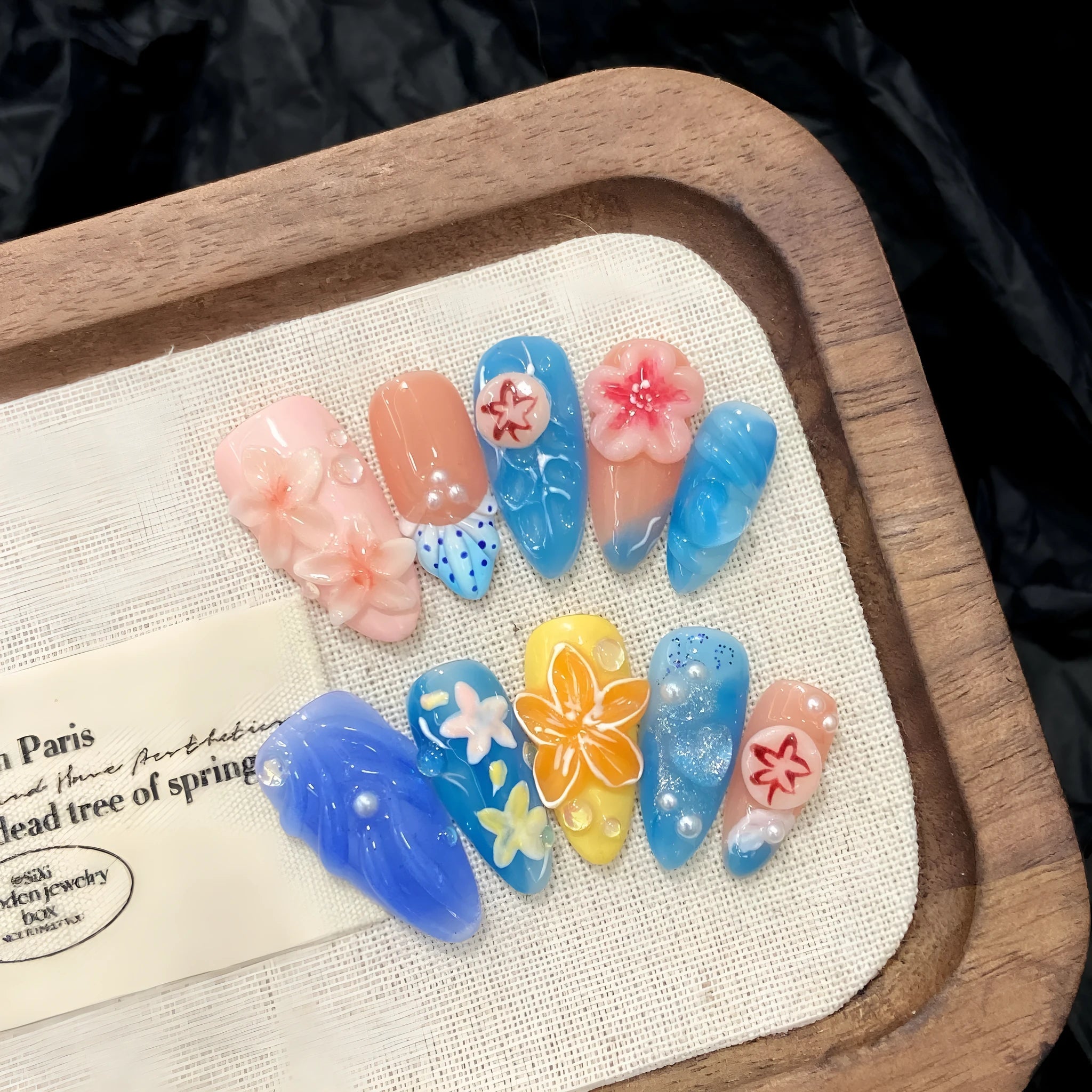 Plastic wearable armour set with 3D carved jellyfish and marine pattern in almond nail colour.