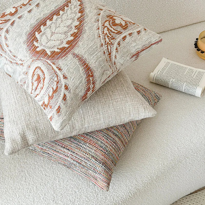 American-style yarn-dyed jacquard sofa cushion with paisley pattern in amber colours