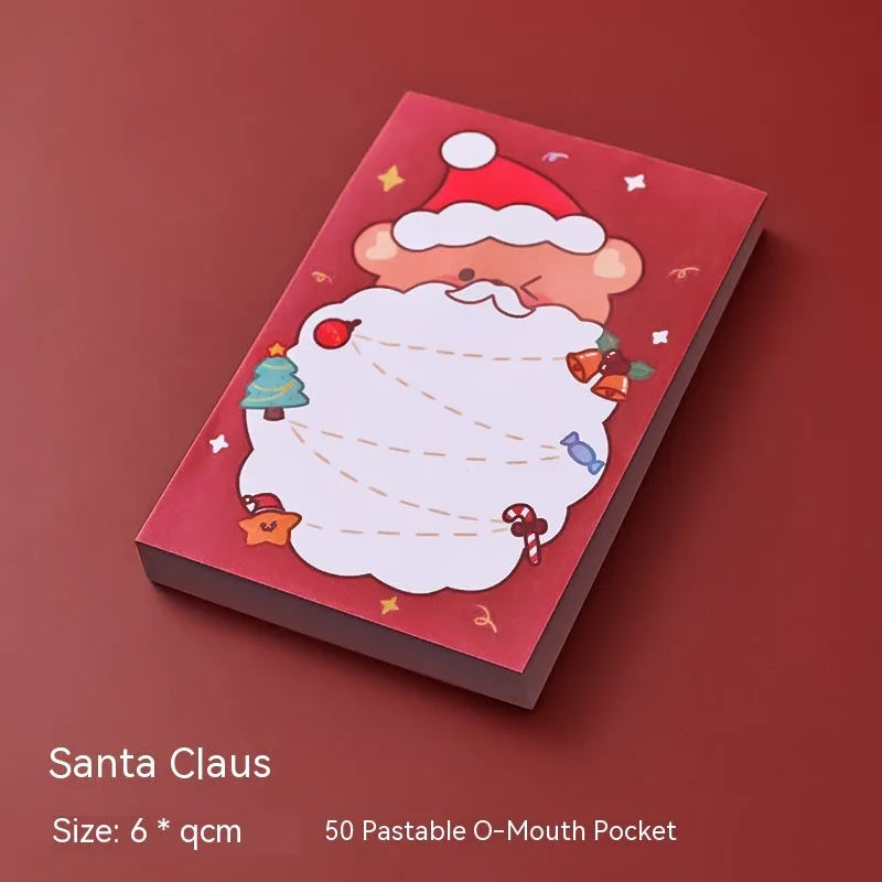 Christmas cartoon sticky notes pad showing eight festive designs including Santa Claus, snowman, and Christmas elf