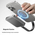 Grey magnetic mobile solid state drive with ultra-thin design next to its C to C cable and magnetic suction ring.