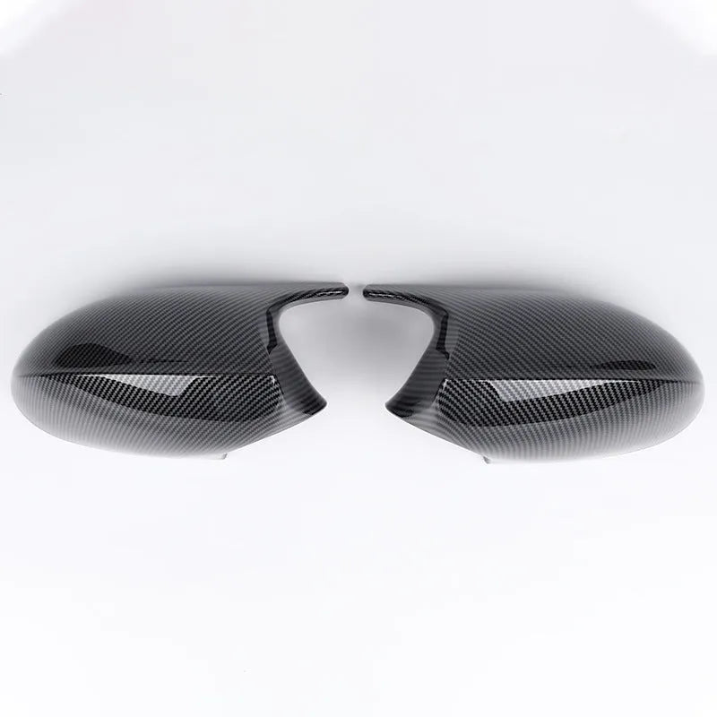 Pair of black ABS plastic rearview mirror shells for BMW 3 Series E90 door mirrors.