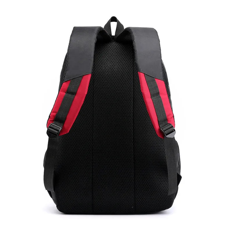 Nylon backpack in four colours with airpillow straps and contrast stitching.