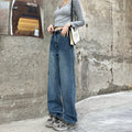 Women's retro blue straight leg jeans with a high waist, shown on a hanger.