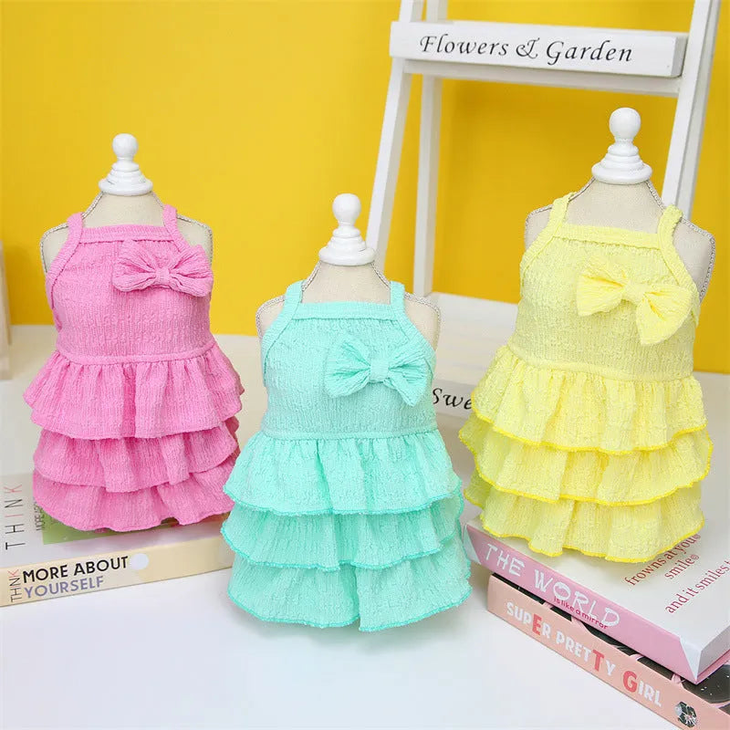 Small dog wearing princess dress with layered candy skirt in choice of rose red, yellow or green colours