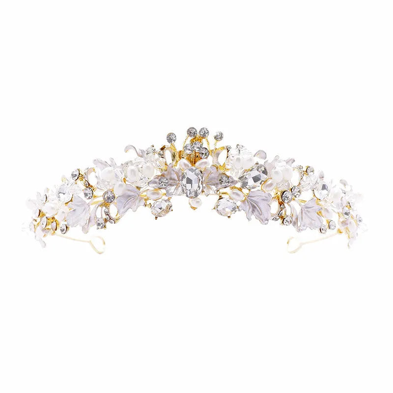 A gold-coloured alloy crown headdress for women with glass pearl decorations on a model's hair.