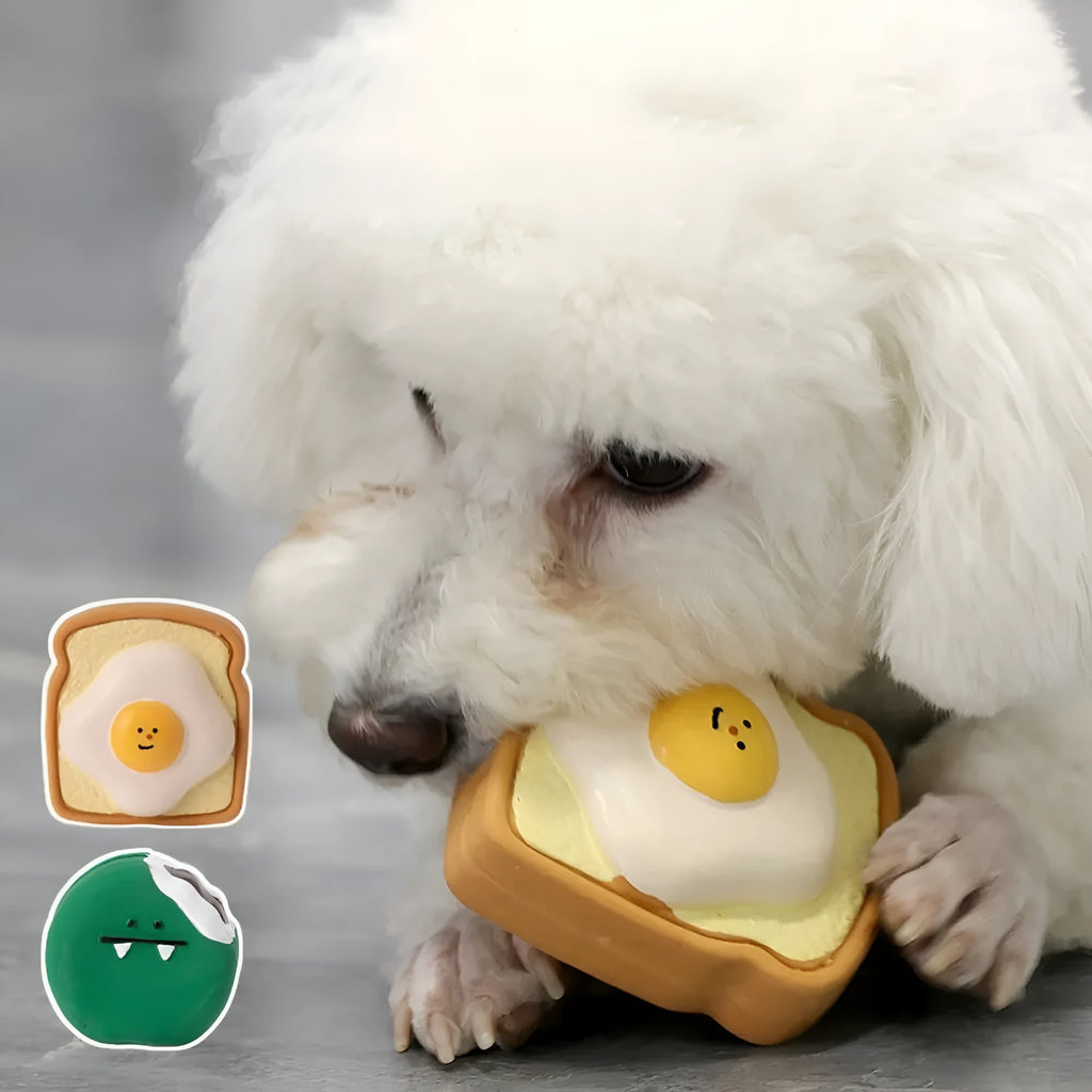 Yellow or green cartoon bread-shaped latex chew toy for dogs with a squeaker inside.