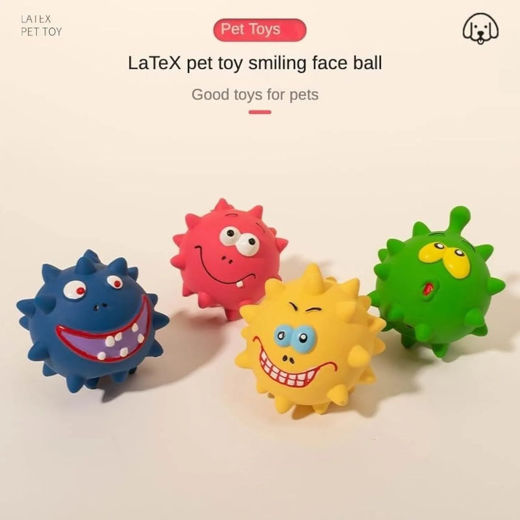 Set of four coloured latex squeaky dog balls with cute face designs on blue green red yellow backgrounds