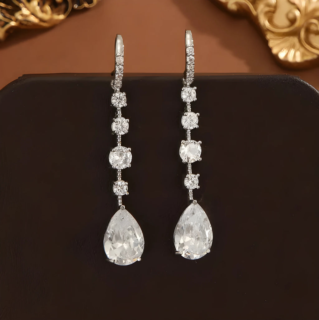 Silver white zircon teardrop drop earrings for women with electroplated copper finish and pear-shaped silhouette