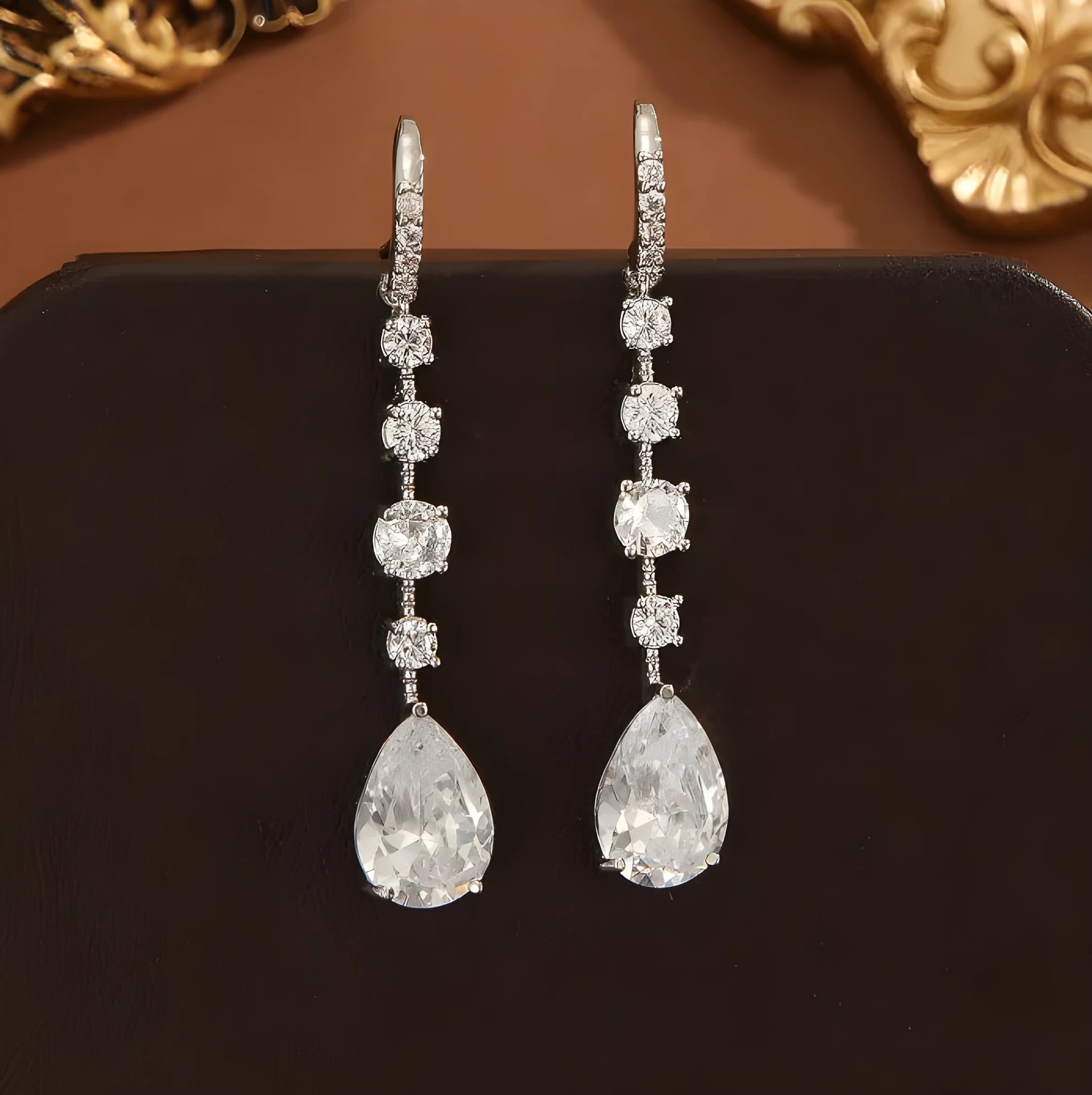 Silver white zircon teardrop drop earrings for women with electroplated copper finish and pear-shaped silhouette