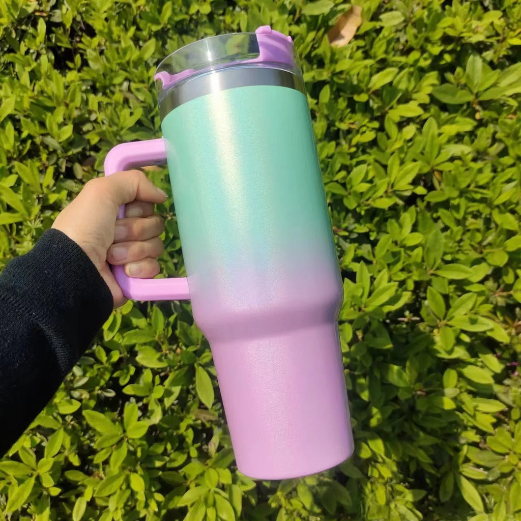Large stainless steel vacuum insulation cup in a rainbow or gradient colour finish.