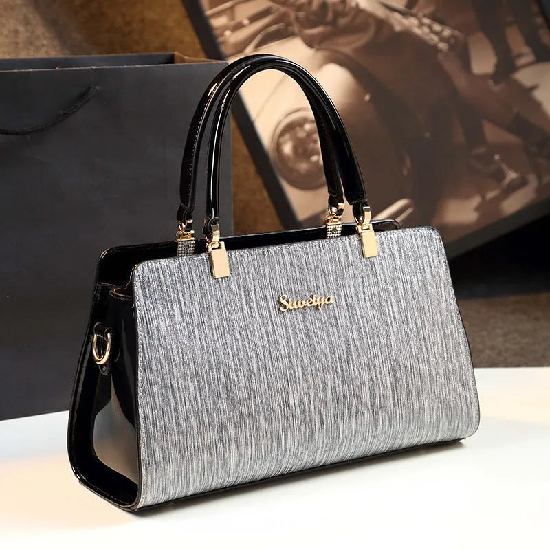 Medium PU leather messenger handbag in horizontal square shape with gold or silver contrast colour