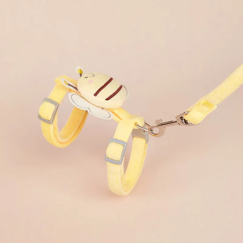 Pink bee-shaped adjustable cat tether rope with strap for outdoor use.