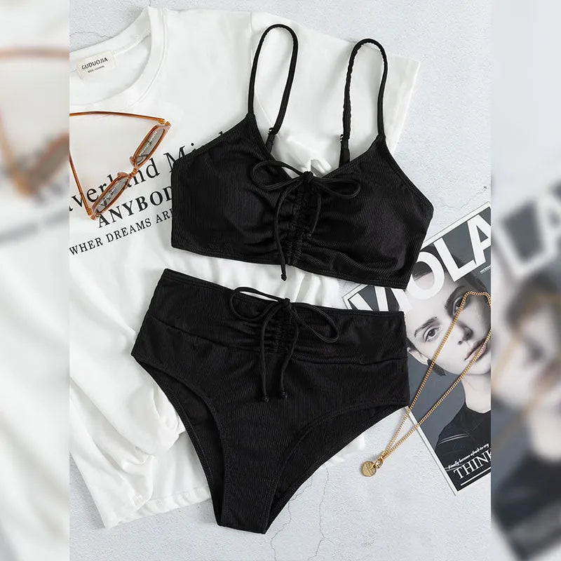 Black high-waisted women's bikini swimsuit with sling split design