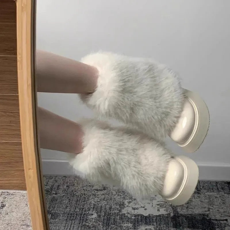 Women's artificial plush snow boots with fleece lining and waterproof platform sole in black or white