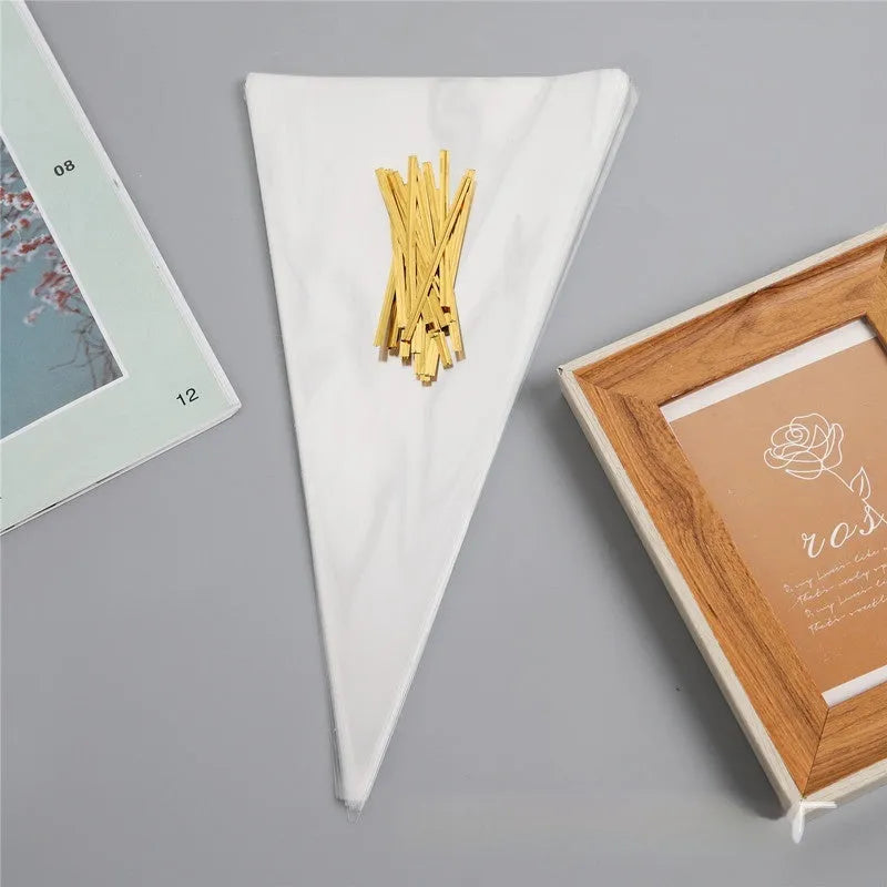 Clear triangular plastic packaging bags with wire ties in three different sizes