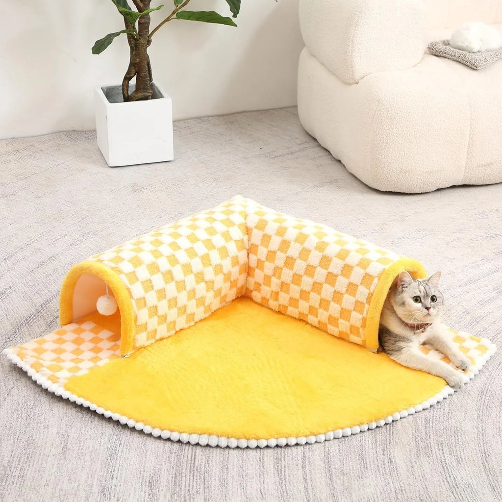 Fan-shaped plush pet bed with integrated tunnel in coffee colour, showing thick mat and anti-slip base.