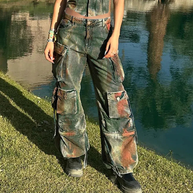 Retro colour blooming loose cargo denim trousers with multiple gradient patch pockets on a model.