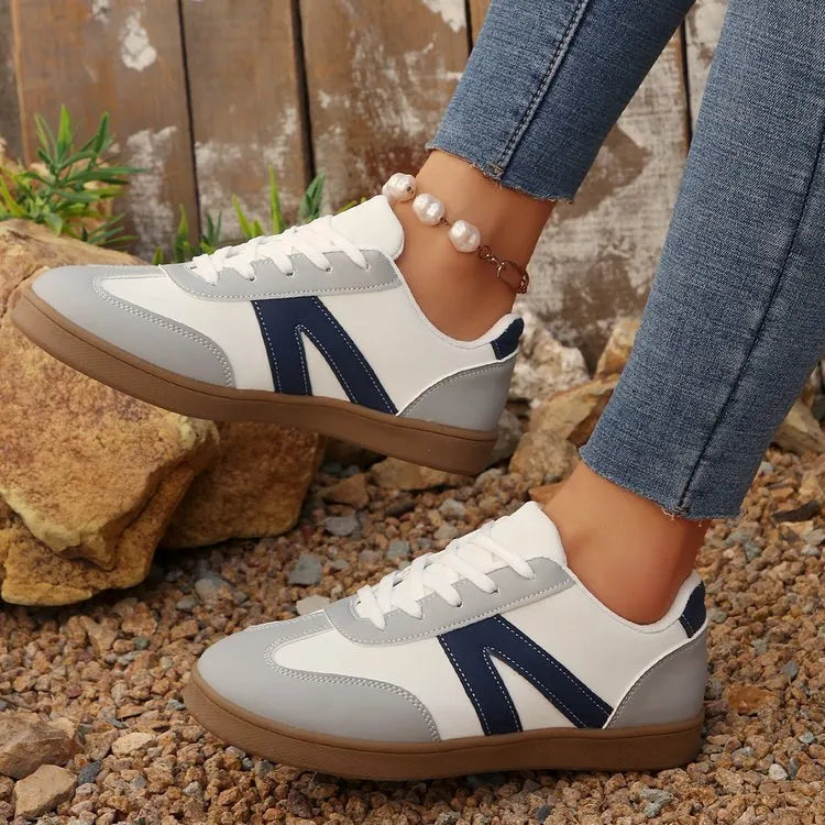 Blue women's low-top lace-up training shoes with artificial PU upper and rubber sole for hiking.