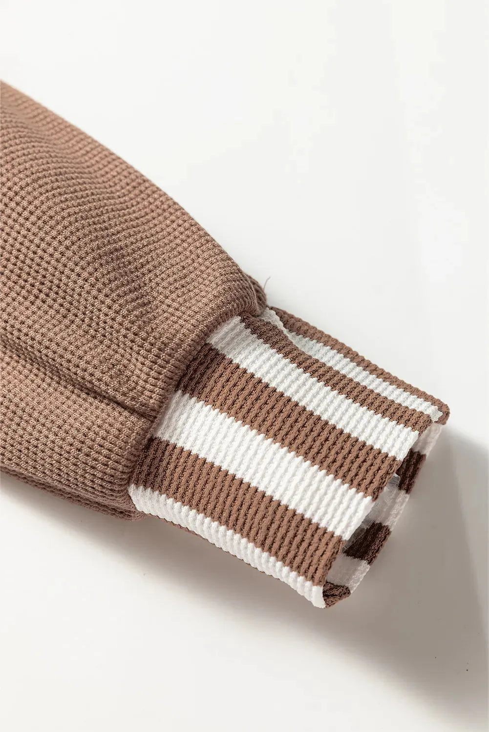 Straw yellow hoodie with waffle texture stripes and patchwork design featuring button neck and drawstring hood