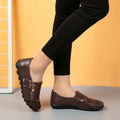Button brand casual leather flat shoes with a Velcro strap, shown in multiple colours on a white background.