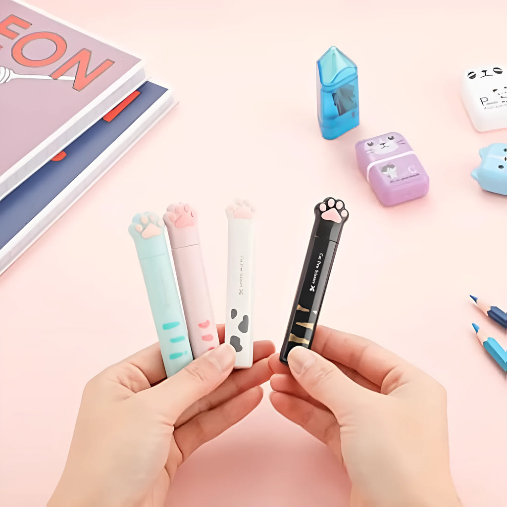 Cat paw mini folding scissors in pink, white, black, and blue colours showing closed and open positions