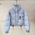 Korean-style stand collar short puffer jacket in solid colour with pleats and princess sleeves, available in yellow, black, raspberry red, and blue