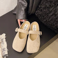 Women's flat apricot slippers with square closed toe, PU upper, and rubber sole.