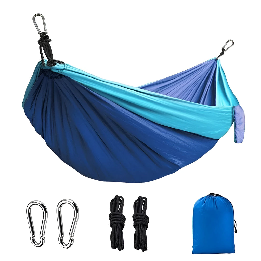 Blue parachute cloth camping hammock hung between trees showing 270cm length