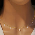 Gentle drop-shaped artificial zircon pendant on an adjustable 925 silver O-chain necklace.