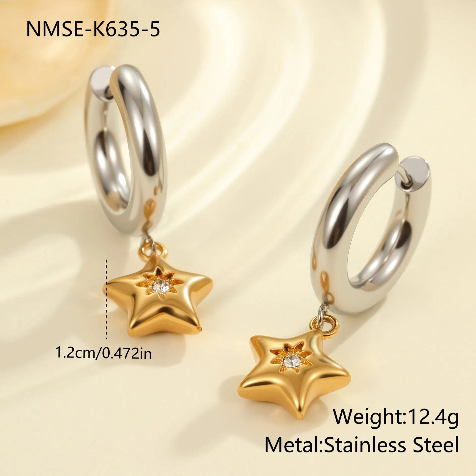 Christmas tree heart earrings in stainless steel with 18K gold plating showing star and geometric shapes